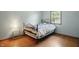 Bright bedroom with a light paint color, hardwood floors, and window views at 1914 S Avon Ave, Avon, IN 46123