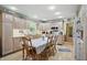 Bright eat-in kitchen featuring wooden cabinets, plenty of counter space, and a dining table at 1914 S Avon Ave, Avon, IN 46123