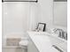 Clean bathroom with a shower-tub combination, and a modern vanity with a sink and chrome faucet at 19652 Shadow Trace Path, Westfield, IN 46074