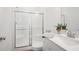 Bright bathroom featuring a glass-enclosed shower and modern vanity at 19652 Shadow Trace Path, Westfield, IN 46074
