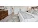 Airy bedroom featuring a cozy rug, walk-in closet, an elegant mirror, and access to other rooms of the house at 19652 Shadow Trace Path, Westfield, IN 46074
