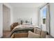 Cozy bedroom featuring a comfortable bed, soft pillows, and a bright window for ample natural light at 19652 Shadow Trace Path, Westfield, IN 46074