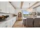 Bright dining area featuring a stylish chandelier, and a large window with views of the outdoors at 19652 Shadow Trace Path, Westfield, IN 46074