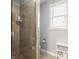 Modern bathroom featuring a glass shower, tile surround, and updated fixtures at 2020 N Park Ave, Indianapolis, IN 46202