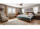 Cozy bedroom with a large bed, natural light, and comfortable seating area at 2020 N Park Ave, Indianapolis, IN 46202