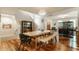 Elegant dining room with an open floor plan, hardwood floors, and a view of the staircase at 2020 N Park Ave, Indianapolis, IN 46202