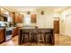 Well-lit kitchen featuring a large island with seating and stainless steel appliances at 2020 N Park Ave, Indianapolis, IN 46202