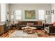 Bright and inviting living room with stylish furnishings, hardwood floors, and ample natural light at 2020 N Park Ave, Indianapolis, IN 46202