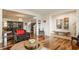 Open-concept living room with hardwood floors, and access to the dining and kitchen areas at 2020 N Park Ave, Indianapolis, IN 46202