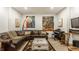 Spacious living room with comfortable leather furniture, neutral paint, and stylish decor at 2020 N Park Ave, Indianapolis, IN 46202