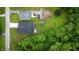 A birds-eye view of a well-kept neighborhood showcasing lush greenery and beautifully maintained homes at 2159 W 58Th Nw St, Indianapolis, IN 46228