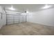 Spacious garage with concrete floor and ample room for parking and storage at 2159 W 58Th Nw St, Indianapolis, IN 46228