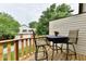 Inviting deck space featuring a table and chairs, ideal for outdoor dining and relaxation at 2442 N Willow Way, Indianapolis, IN 46268