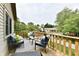 Relaxing deck area with outdoor seating, perfect for enjoying the surrounding greenery at 2442 N Willow Way, Indianapolis, IN 46268