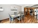 Open dining area with gray table set, and kitchen in the background at 2442 N Willow Way, Indianapolis, IN 46268