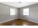 Empty bedroom with hardwood floors, window, and fresh paint at 255 N Pasadena Rd, Noblesville, IN 46062