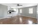 Open-concept living room features hardwood floors, gray walls, and white trim at 255 N Pasadena Rd, Noblesville, IN 46062