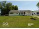 Single-story home featuring a well-maintained front lawn at 26 Crescent Ct, Chesterfield, IN 46017