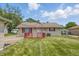 Charming home with a well-maintained backyard and small deck in natural light at 2908 N Routiers Ave, Indianapolis, IN 46219