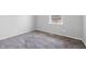 Bedroom featuring carpet and soft gray walls with window offering plenty of light at 2908 N Routiers Ave, Indianapolis, IN 46219
