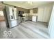Spacious kitchen with stainless appliances and modern flooring at 3106 Southwest Dr, Indianapolis, IN 46241