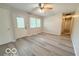 Light and airy living room features new flooring and exterior access at 3106 Southwest Dr, Indianapolis, IN 46241