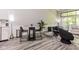 Open-concept living area with modern furniture, stylish decor, and ample natural light at 3620 N Lakeside Dr, Muncie, IN 47304
