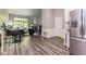 Open concept featuring kitchen, dining, and living room with fireplace at 3620 N Lakeside Dr, Muncie, IN 47304
