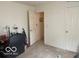Functional bedroom featuring neutral walls and flooring, with room for a desk or study area at 3861 Indigo Blue Blvd, Whitestown, IN 46075