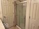 Shower featuring a glass door, a shower curtain and ceramic tile flooring at 3861 Indigo Blue Blvd, Whitestown, IN 46075