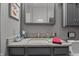 Bathroom vanity features granite countertop, stylish fixtures, and a mirrored medicine cabinet at 3916 St Simons Ct, Indianapolis, IN 46237