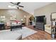 Comfortable living room with hardwood floors, a fireplace, and stylish decor at 3916 St Simons Ct, Indianapolis, IN 46237