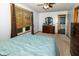 Bright bedroom with neutral carpet, wood blinds, dresser and convenient ensuite access at 4901 E County Road 100 N, Avon, IN 46123