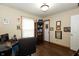 Home office with desk, bookcase, and vinyl plank floors at 4901 E County Road 100 N, Avon, IN 46123