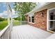 Inviting outdoor porch showcasing a brick exterior, large windows, and bright natural light at 4901 E County Road 100 N, Avon, IN 46123