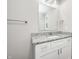 Bright bathroom with a granite countertop, vanity, and mirror at 496 N County Road 325 W, Danville, IN 46122