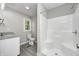 Bright bathroom featuring a granite sink and a walk-in shower at 496 N County Road 325 W, Danville, IN 46122