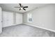 Large bedroom with neutral colors, a ceiling fan, and lots of natural light at 496 N County Road 325 W, Danville, IN 46122