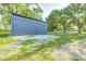 View of a storage shed featuring metal siding with a rock path leading to the unit at 496 N County Road 325 W, Danville, IN 46122