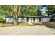 A welcoming front view of a single-story home boasting a brick facade and modern black trim at 496 N County Road 325 W, Danville, IN 46122