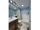 Clean bathroom with modern fixtures, a large mirror, and a shower-tub combination at 5491 Vin Rose Ln, Lawrence, IN 46226