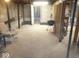 Unfinished basement with bare concrete walls and flooring, ready for renovation at 5570 Paradise Ct, Martinsville, IN 46151