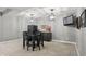 Finished basement with snack bar featuring a mini fridge, microwave, sink, and popcorn machine at 6882 Bladstone Rd, Noblesville, IN 46062