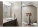 Charming bathroom with a granite countertop vanity and walk-in shower at 6882 Bladstone Rd, Noblesville, IN 46062