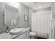 Neat bathroom featuring a single sink vanity and shower-tub combo at 6882 Bladstone Rd, Noblesville, IN 46062