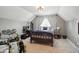 Cozy bedroom with sloped ceilings and a drum set at 6882 Bladstone Rd, Noblesville, IN 46062