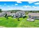 An aerial view of the rear of this two story home showing a spacious yard and patio at 6882 Bladstone Rd, Noblesville, IN 46062