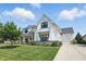 Stunning two-story home with a three-car garage and well-manicured landscaping at 6882 Bladstone Rd, Noblesville, IN 46062