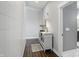 Hallway features a white storage cabinet with glass doors and decorative accents at 6882 Bladstone Rd, Noblesville, IN 46062