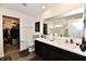 Double vanity in a bathroom with a walk-in closet and a separate shower at 6883 Honeysuckle Way, Pendleton, IN 46064